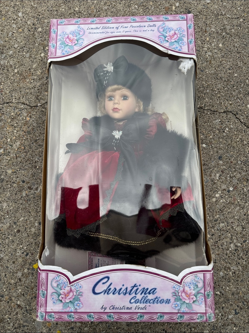 Porcelain Doll in Red and Black new in box